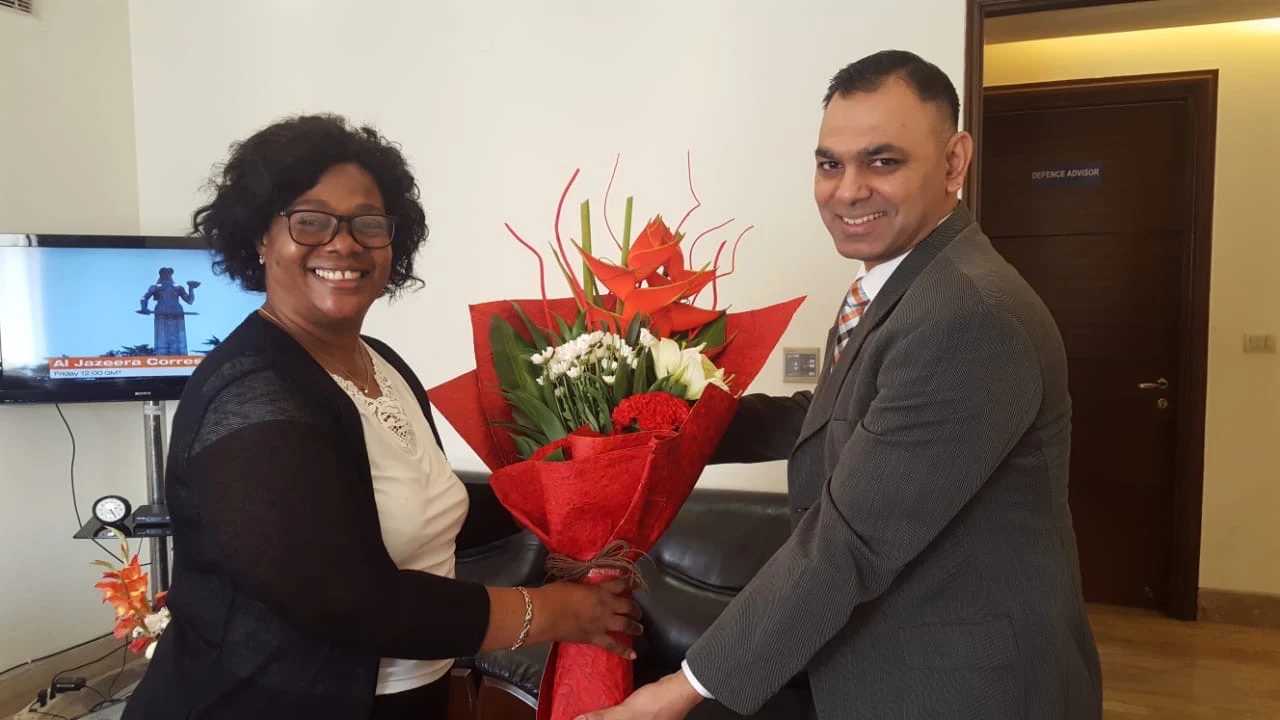 Amit Suden meeting an international delegate